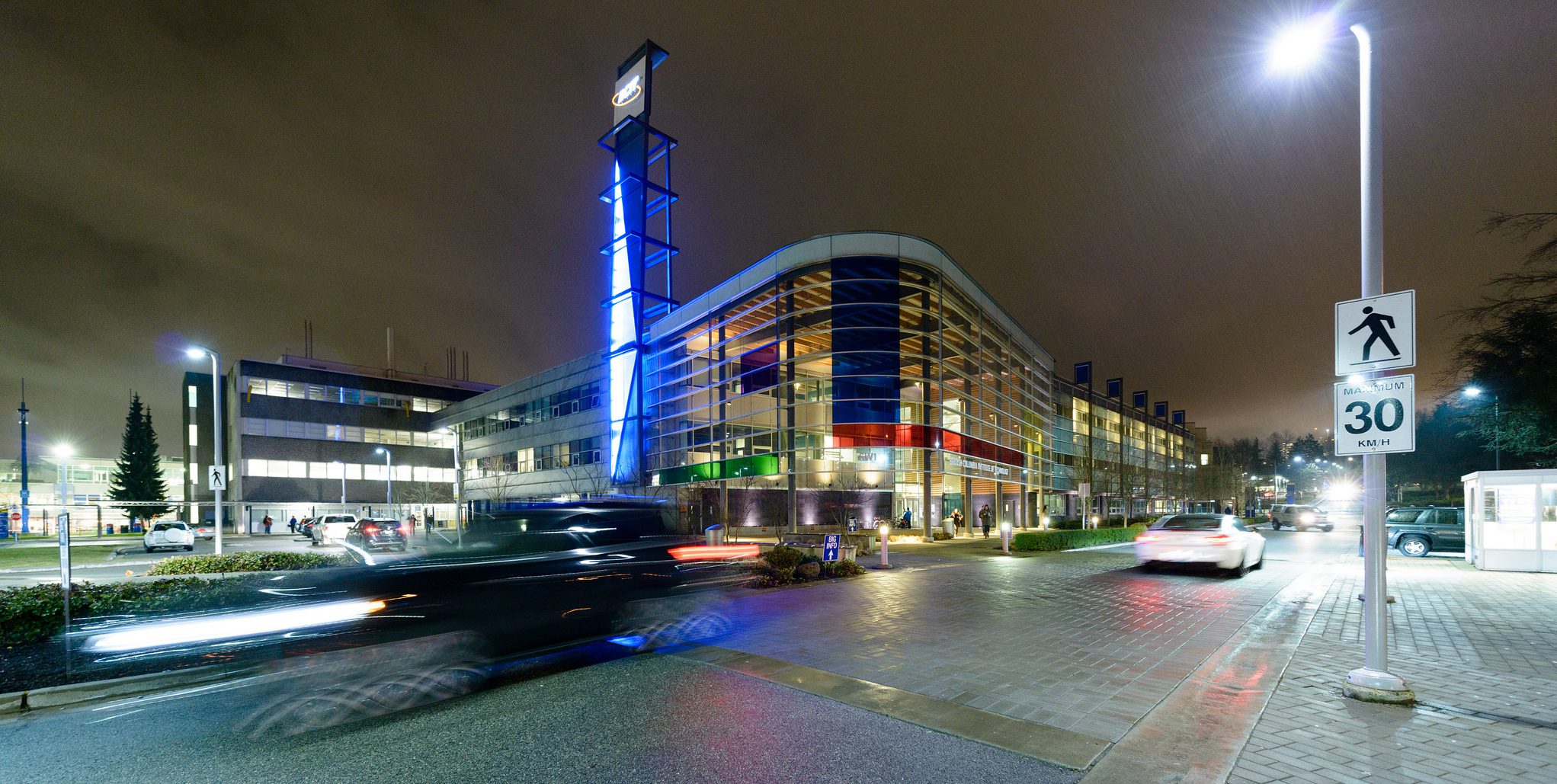 Burnaby building SW1 at night. Well let with rainbow colours.