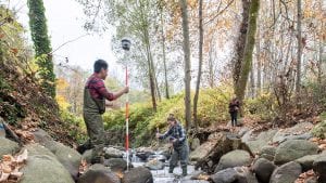 Students testing water quality at Guichon creek.