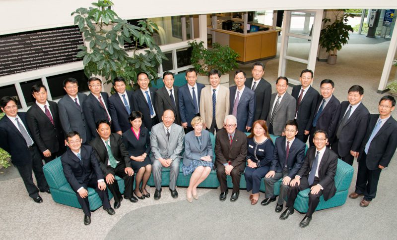 Institutional Executives posing for a group photo with at BCIT.