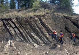 Students examining exposed rock face near BCIT's Field School, Oliver, B.C.