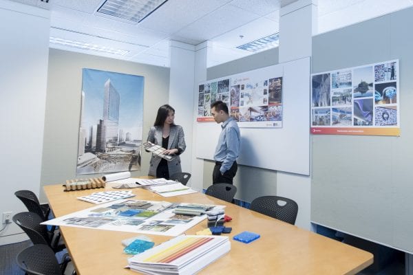 interior design students behind a long table