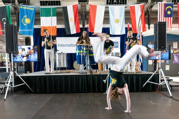 Capoeira dance performers on stage at BCIT for International Education Week performance