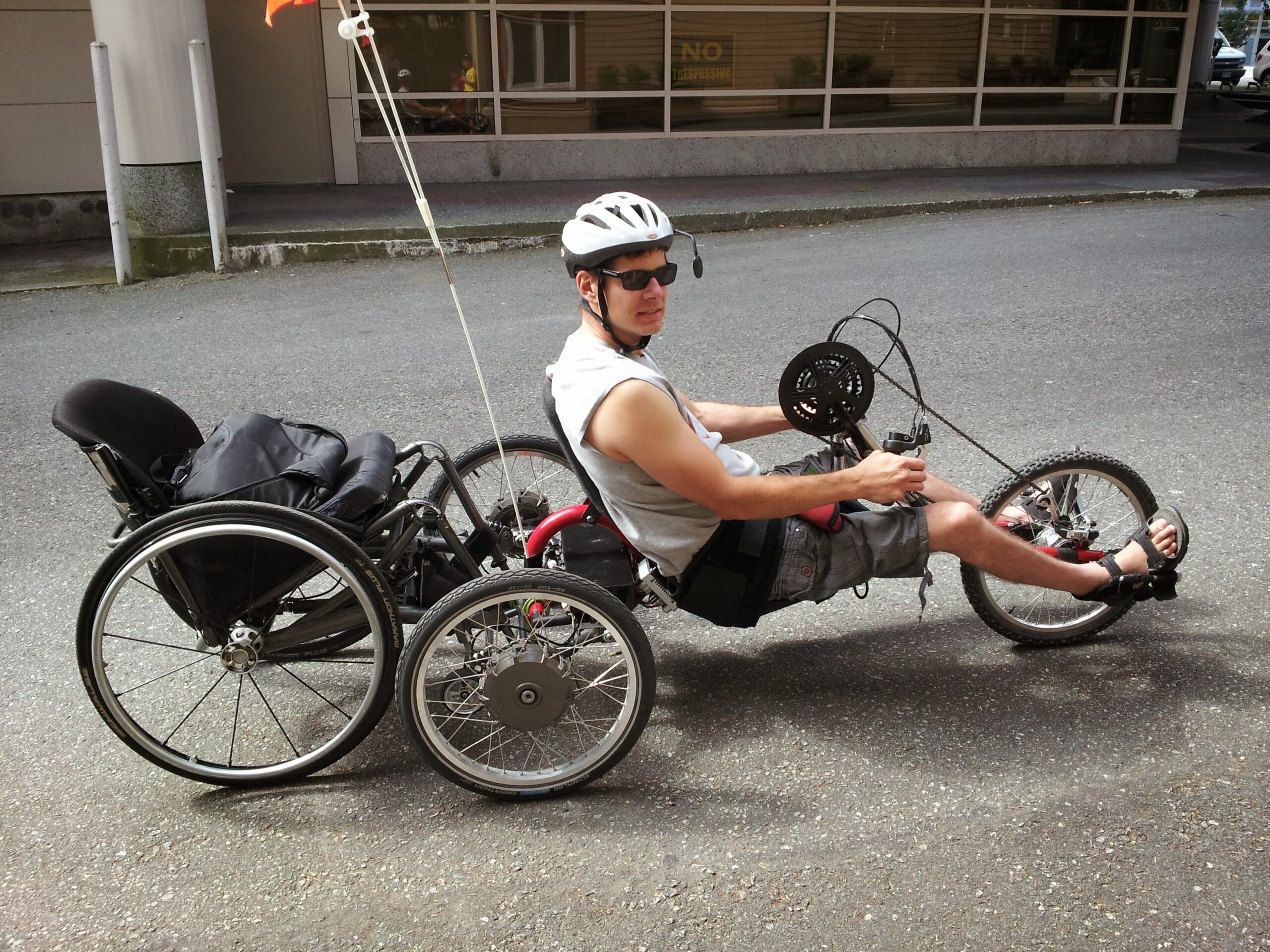 Jaimie Borisoff in a tandem recumbent bike on the road