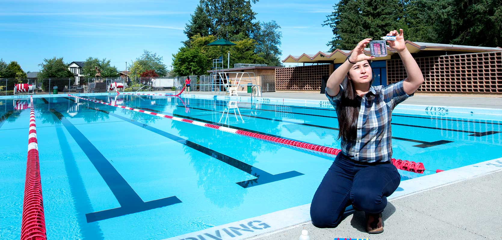 environmental public health inspector testing swimming pool